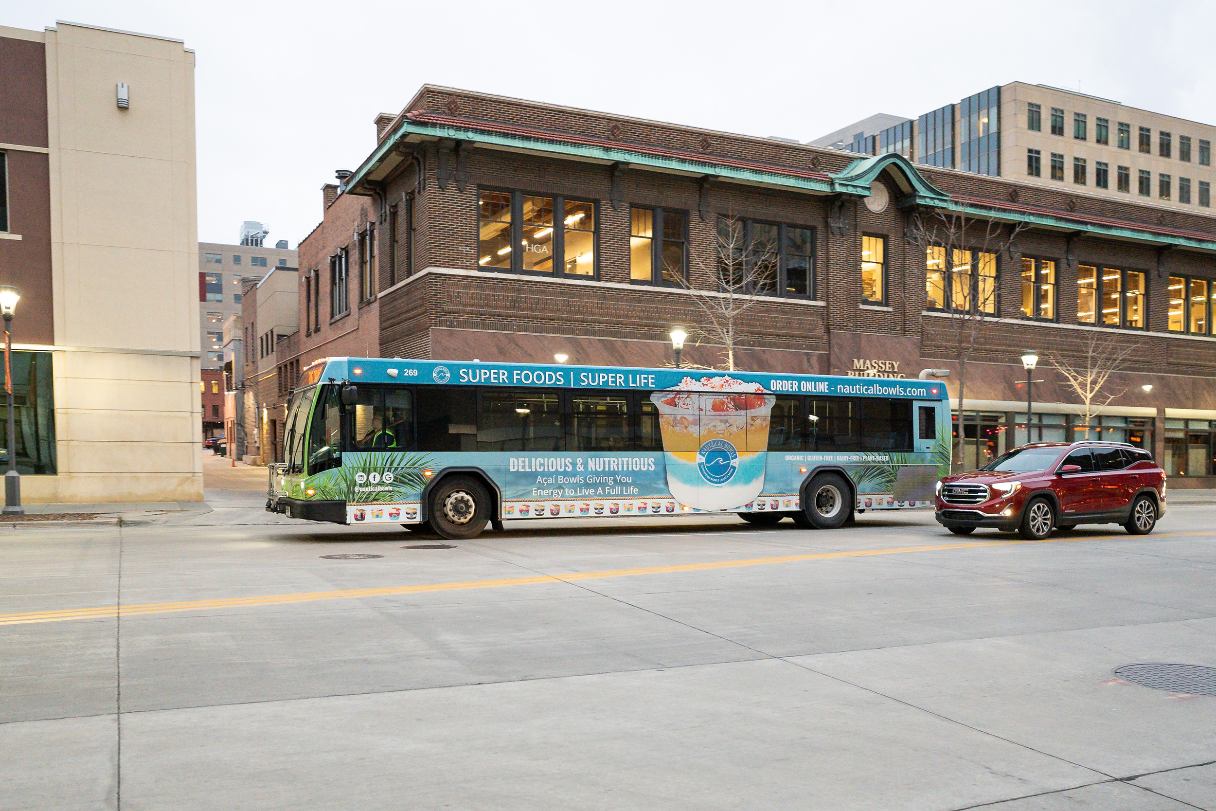 Nautical Bowls bus-side advertisement in a downtown